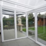 Pergola blanche avec plaque polycarbonate